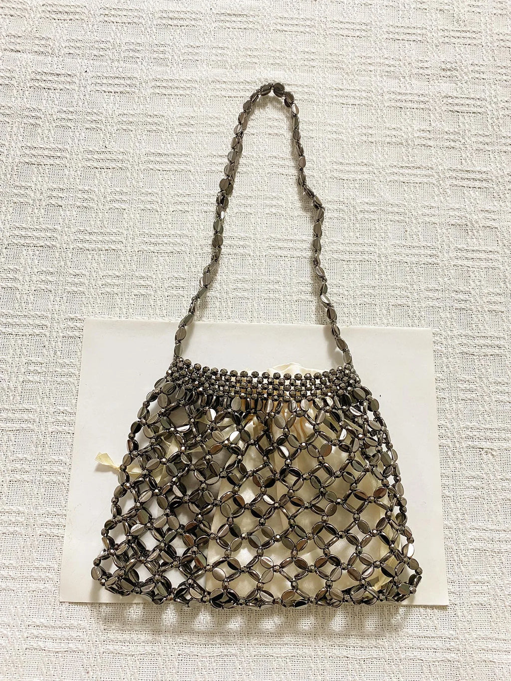 New handheld niche design silver handmade bead woven handbag essential for summer shoulder bag