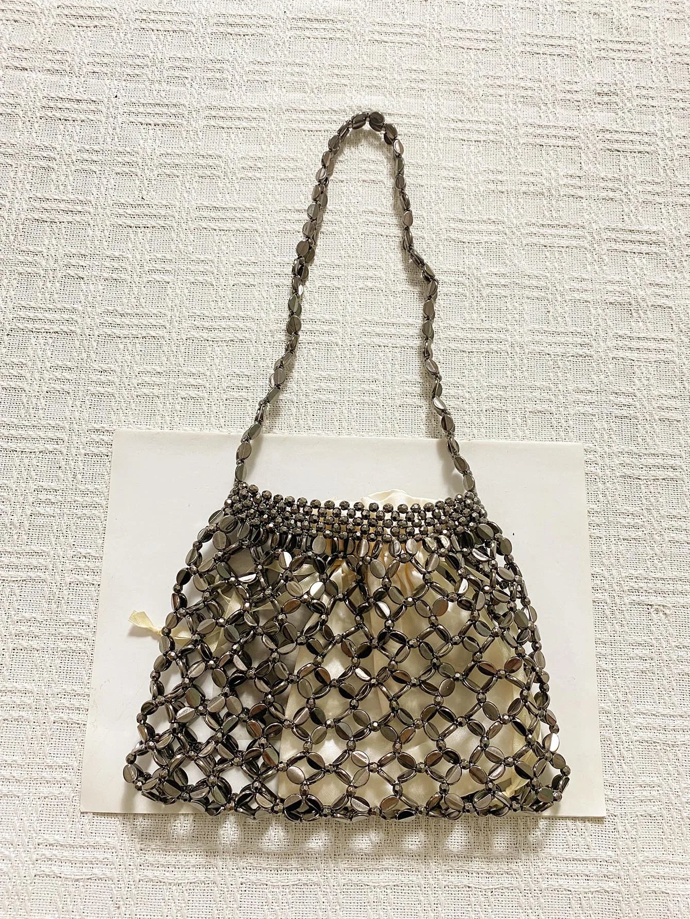 New handheld niche design silver handmade bead woven handbag essential for summer shoulder bag