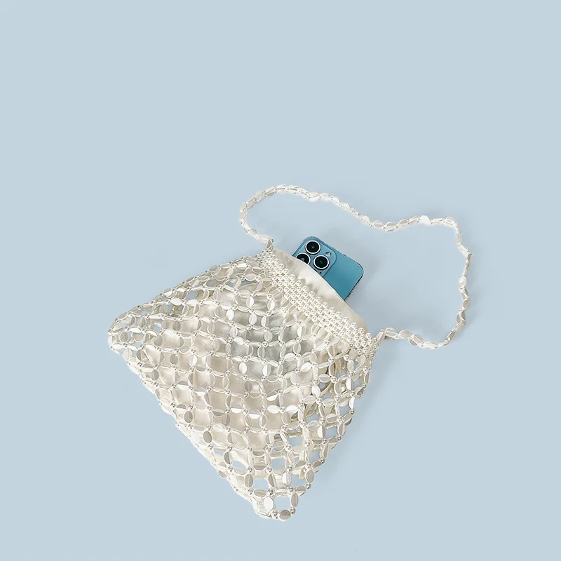 New handheld niche design silver handmade bead woven handbag essential for summer shoulder bag