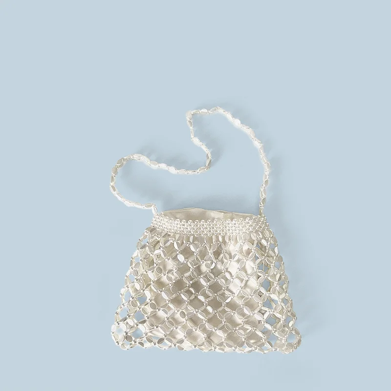 New handheld niche design silver handmade bead woven handbag essential for summer shoulder bag