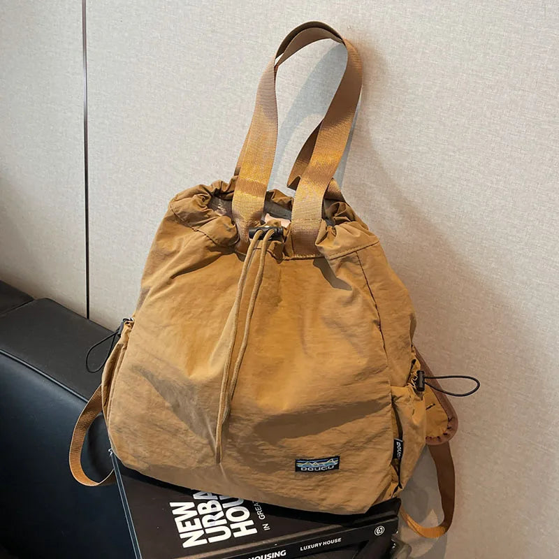 Handbag, solid color, minimalist style, large capacity, portable women's bag, minimalist style multifunctional backpack.